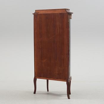 A Louis XV style cabinet, first half of the 20th century.