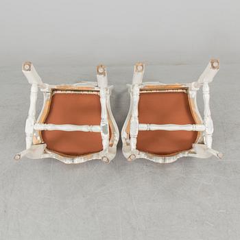 A pair of late 19th century rococo style chairs.