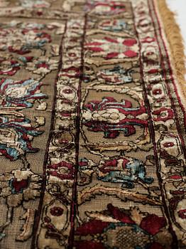 A carpet, an antique silk metal brocaded Kashan, probably around 1910, ca 200-202,5 x 129-131 cm.