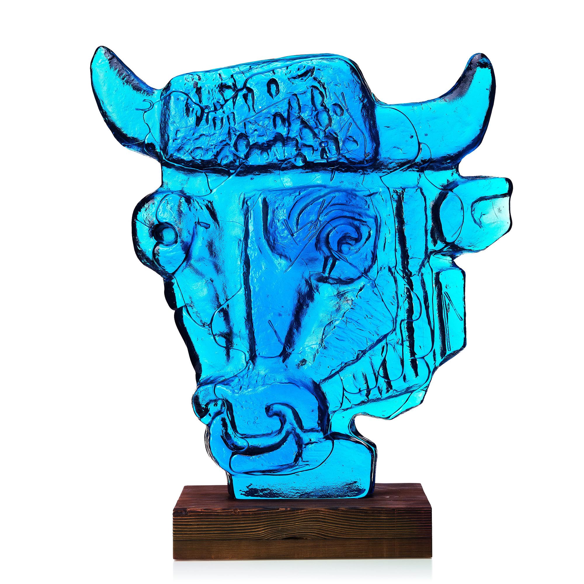 Edvin Öhrström, a blue/ turquoise coloured cast glass sculpture of a bull's head, Lindshammar glassworks, Sweden, signed and dated 1953.