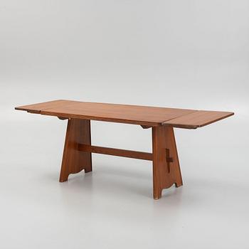 Göran Malmvall, a pine dining table and three chairs, mid 20th century.