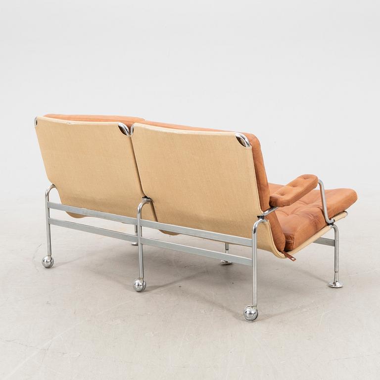 Bruno Mathsson, a karin leather adn chrome sofa Dux later part of the 20th century.