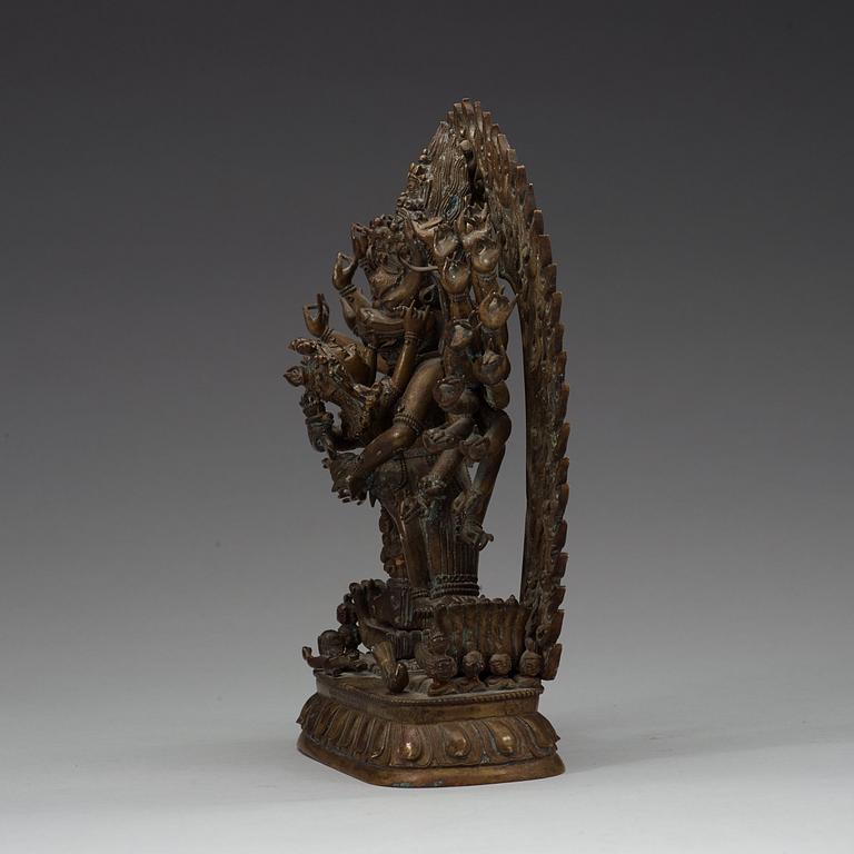 A bronze figure of Yamantaka Vajrabhairava and consort, Tibeto-Chinese, circa 1900.