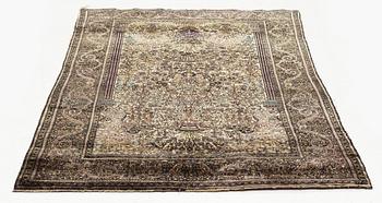 An antique silk Feraghan carpet, ca 195 x  121 cm.