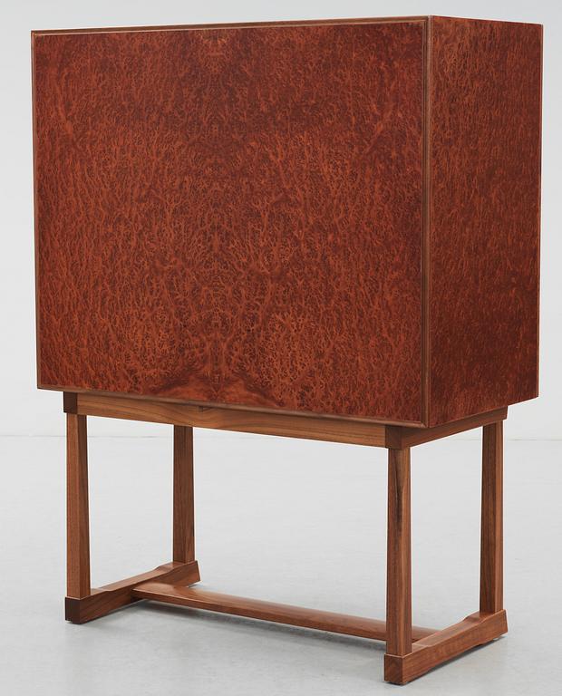 A Josef Frank cabinet on stand, model nr 881, by Svenskt Tenn.