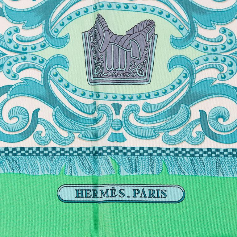 Hermès, a 'La Présentation' silk scarf.