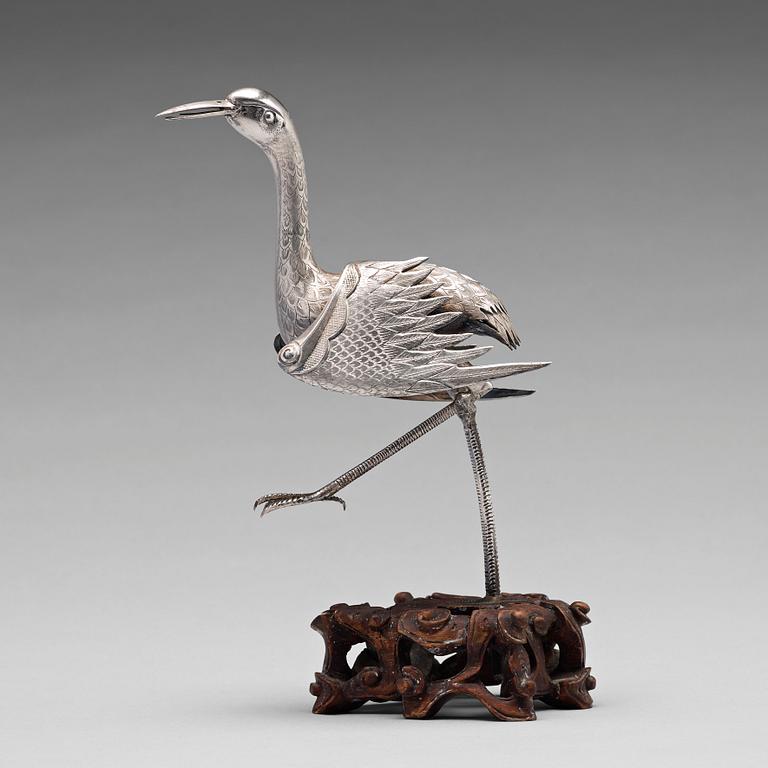 A silver crane, late Qing dynasty.