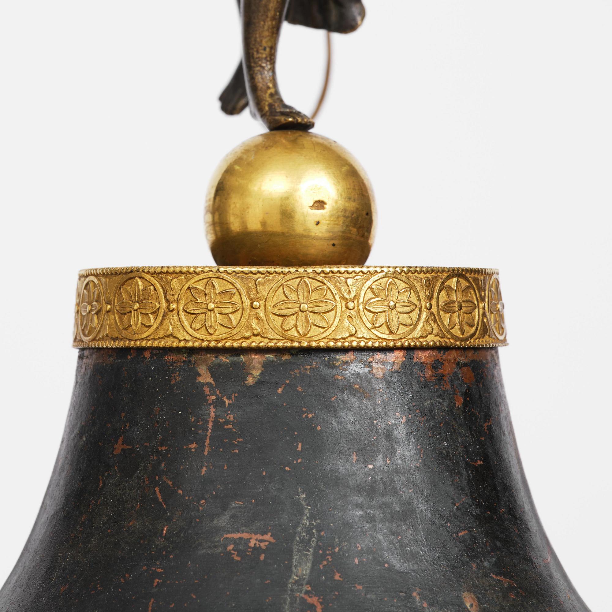 A patinated and ormolu six-light Empire chandelier, Stockholm, first part 19th century.