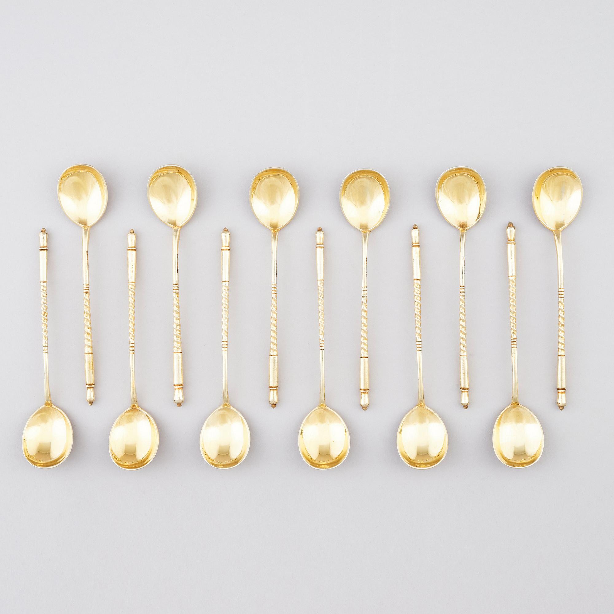 Twelve gilt silver teaspoons, marks of Nikolai Alekseev, Moscow 1886.