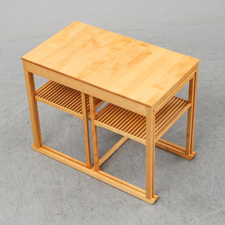 CARL MALMSTEN, a set of three nesting birch tables 'Släden' (The sled), City Möbler AB.
