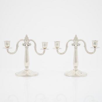 A pair of Swedish silver candelabra, mark of GAB, Stockholm 1931.