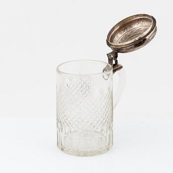 A glass tankard with mount of low fineness silver, 19-20th century.