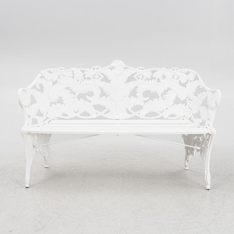 A garden sofa, early 20th Century.