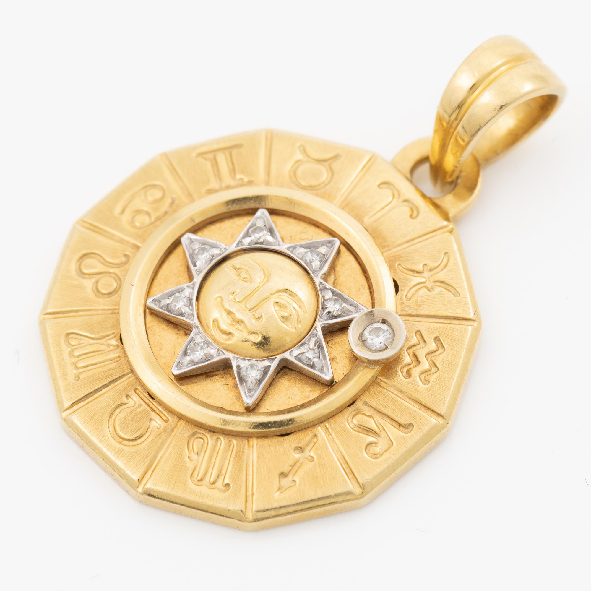Berlock, zodiak, 18K guld med briljantslipade diamanter.