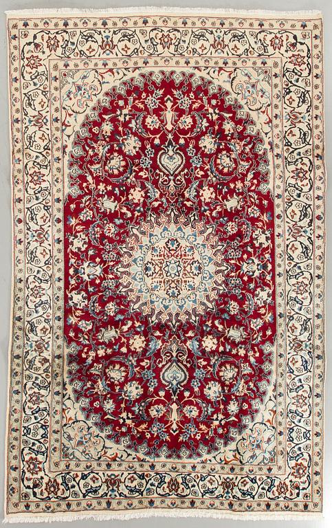 An old Nain carpet ca 292 x 195 cm.