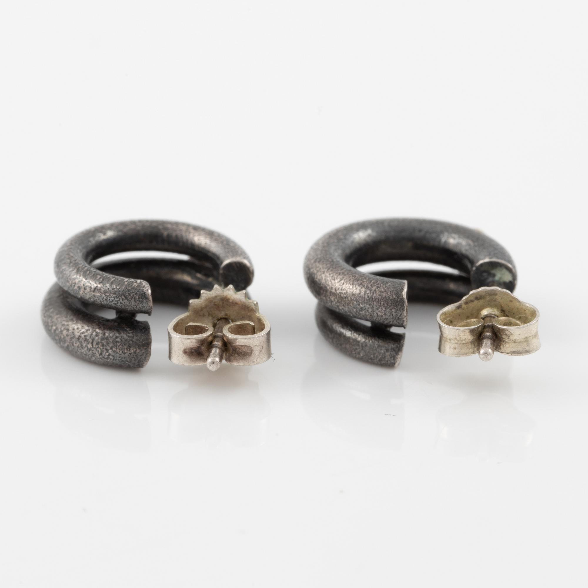 Bracelet, necklace, a pair of earrings, and a ring, Pia Rauff, silver with small diamonds.