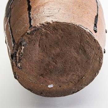 A South East Asian brown and black glazed jar, 14th/17th Century.