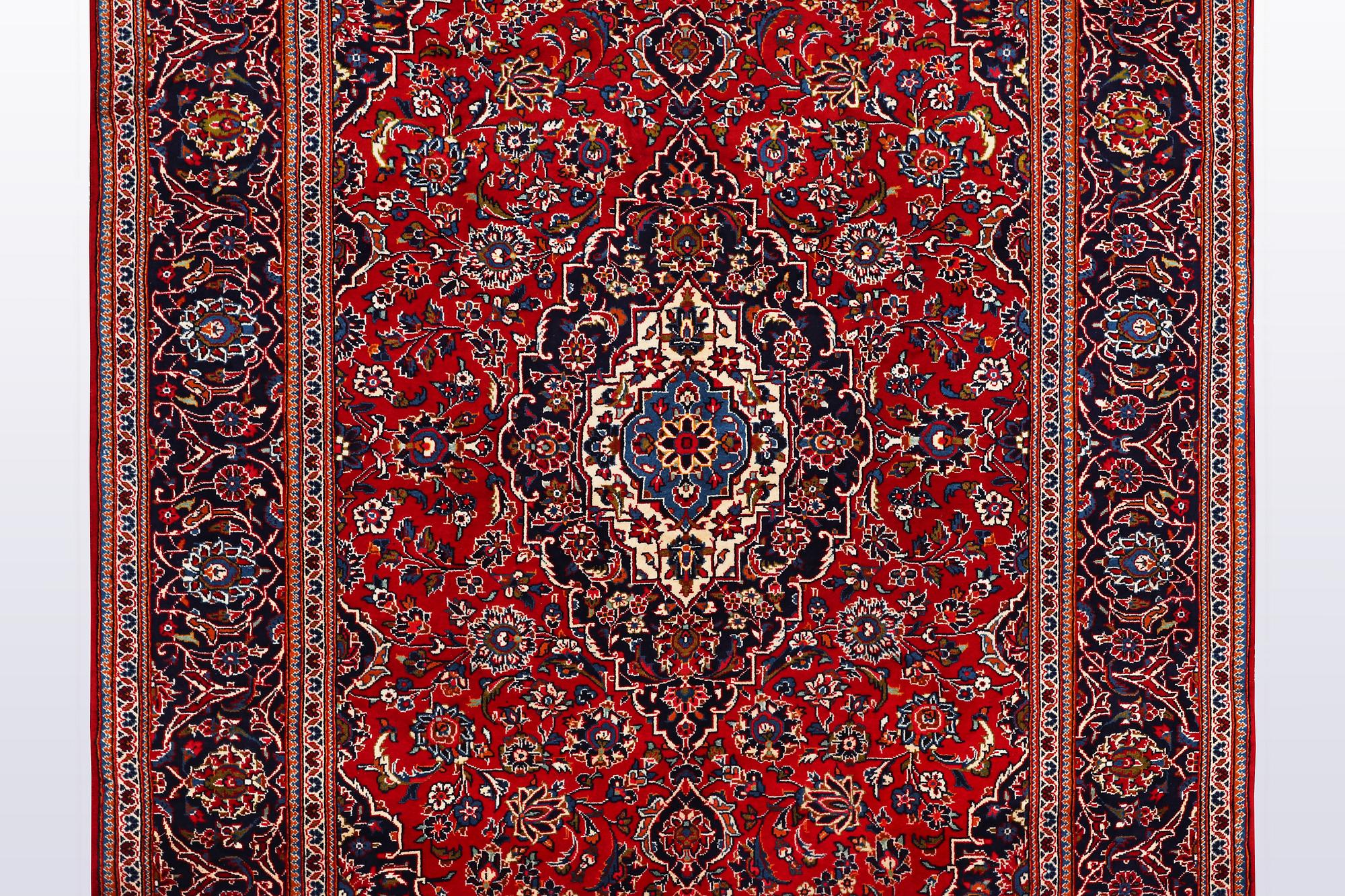 A carpet, Kashan, 308 x 202 cm.