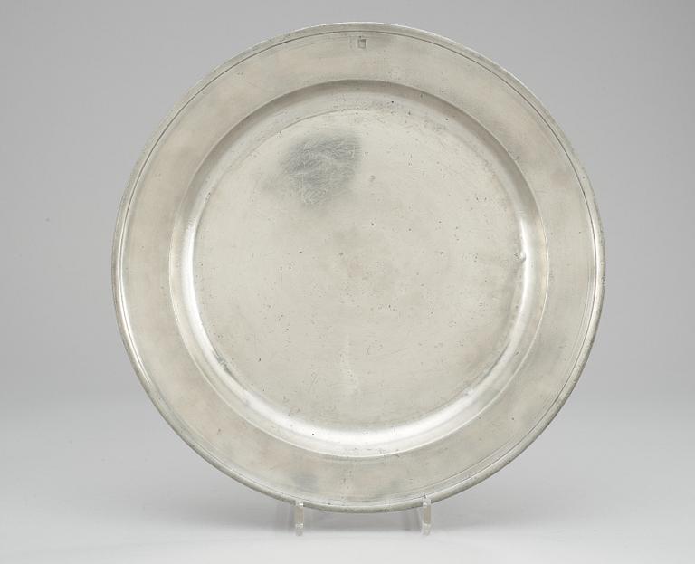 A pewter plate, makers mark by Peter Karm, Hudiksvall (1756-1758).