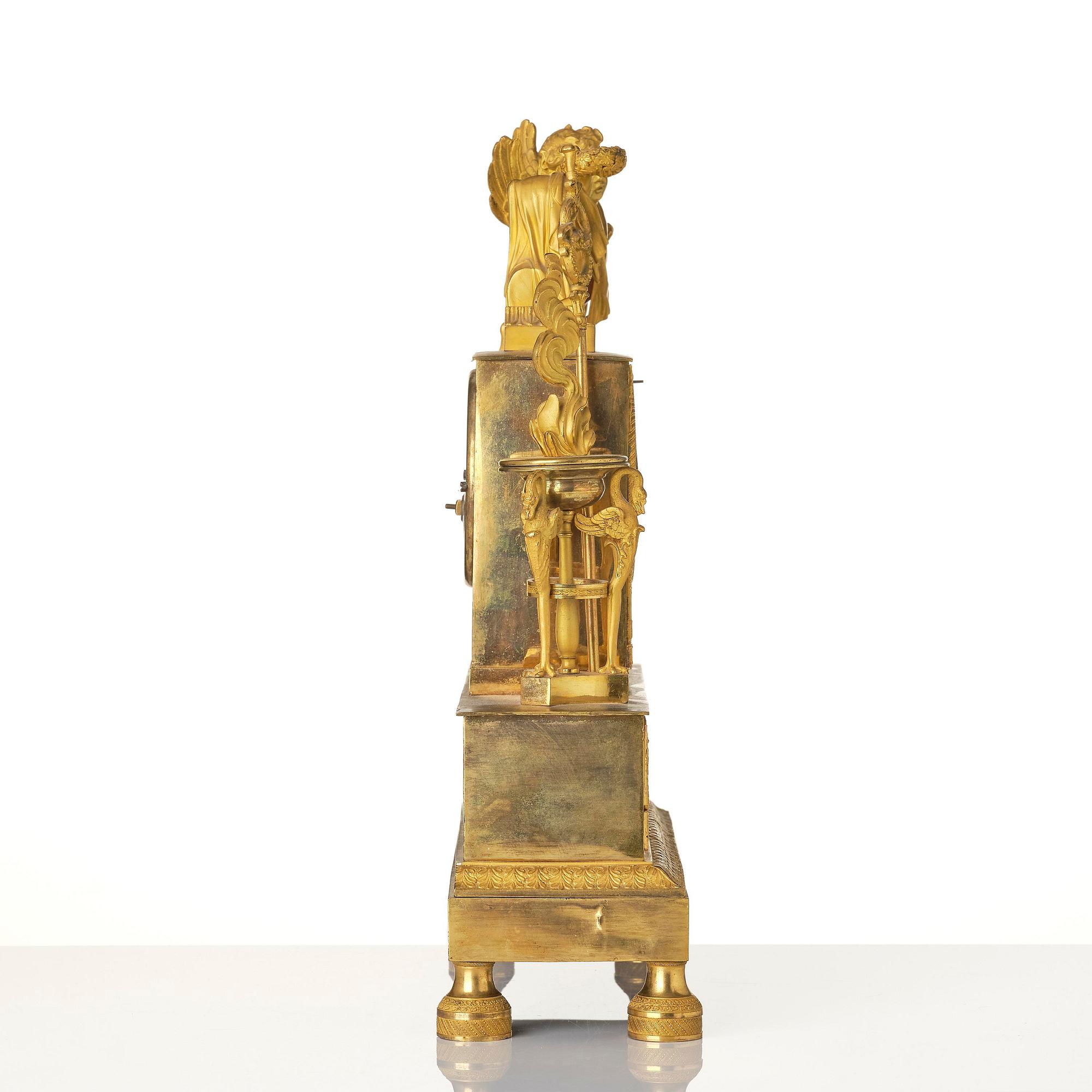 A French Empire ormolu figural mantel clock, early 19th century.