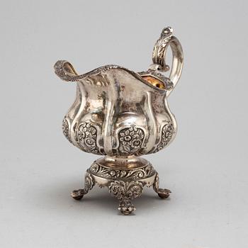 A Russian parcel-gilt silver creamer,  1842, probably Moscow.