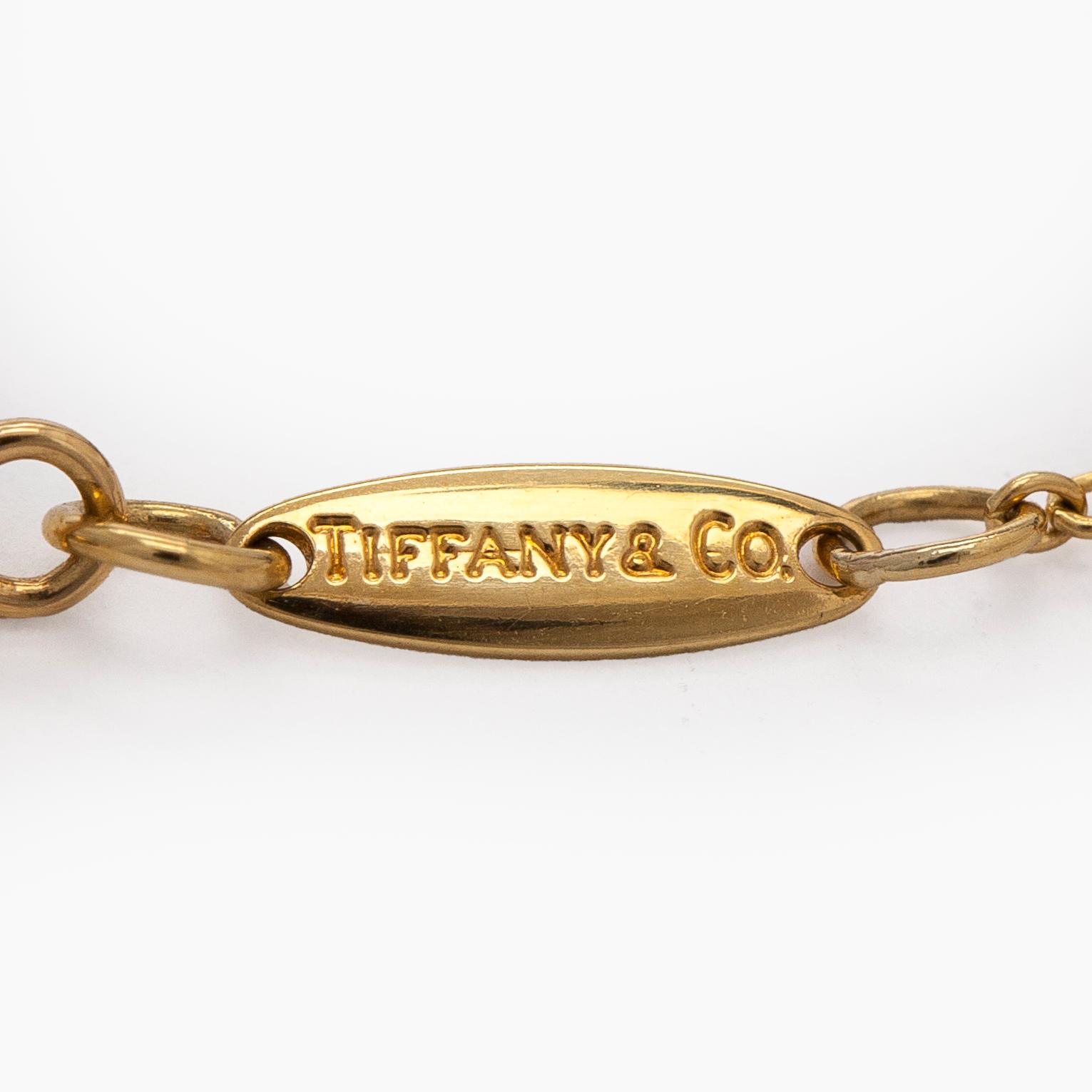 Tiffany & Co, Elsa Peretti, halsband, "Open Heart", 18K guld och gula diamanter.