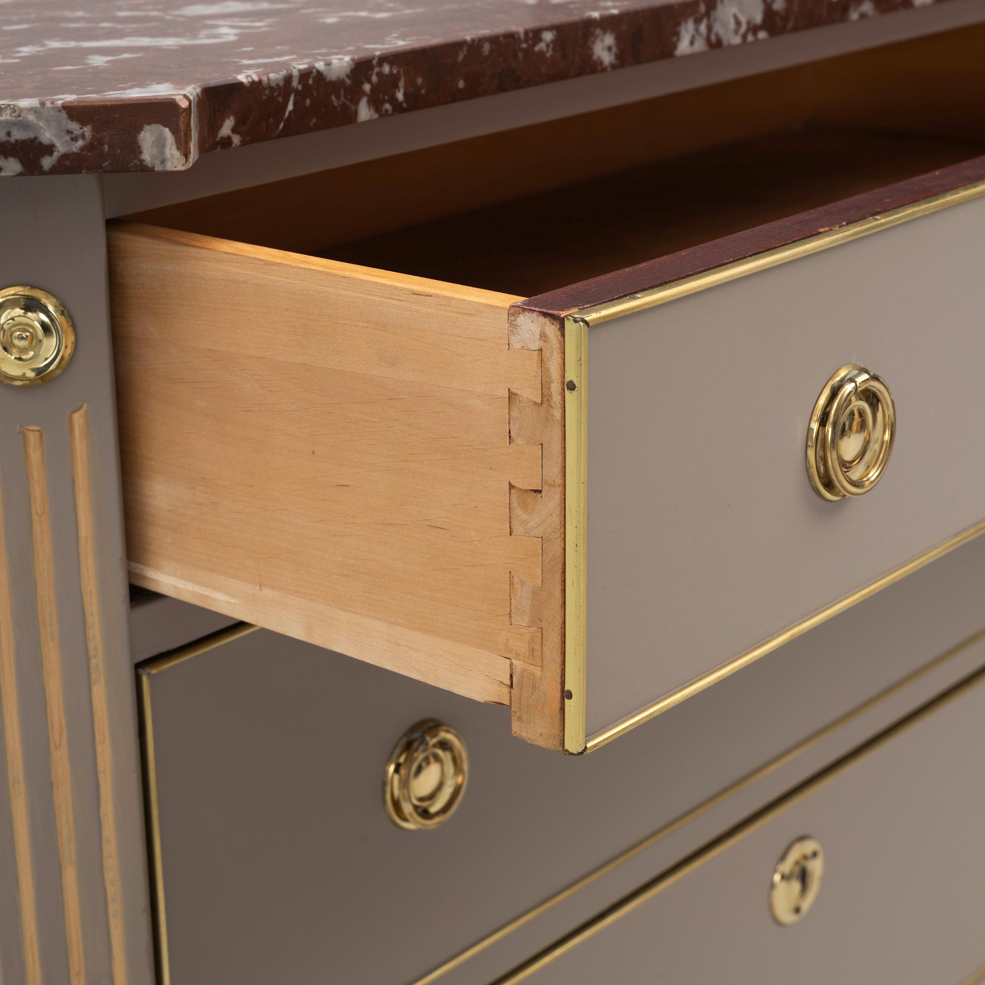 A Gustavian style chest of drawers, Mid 20th Century.
