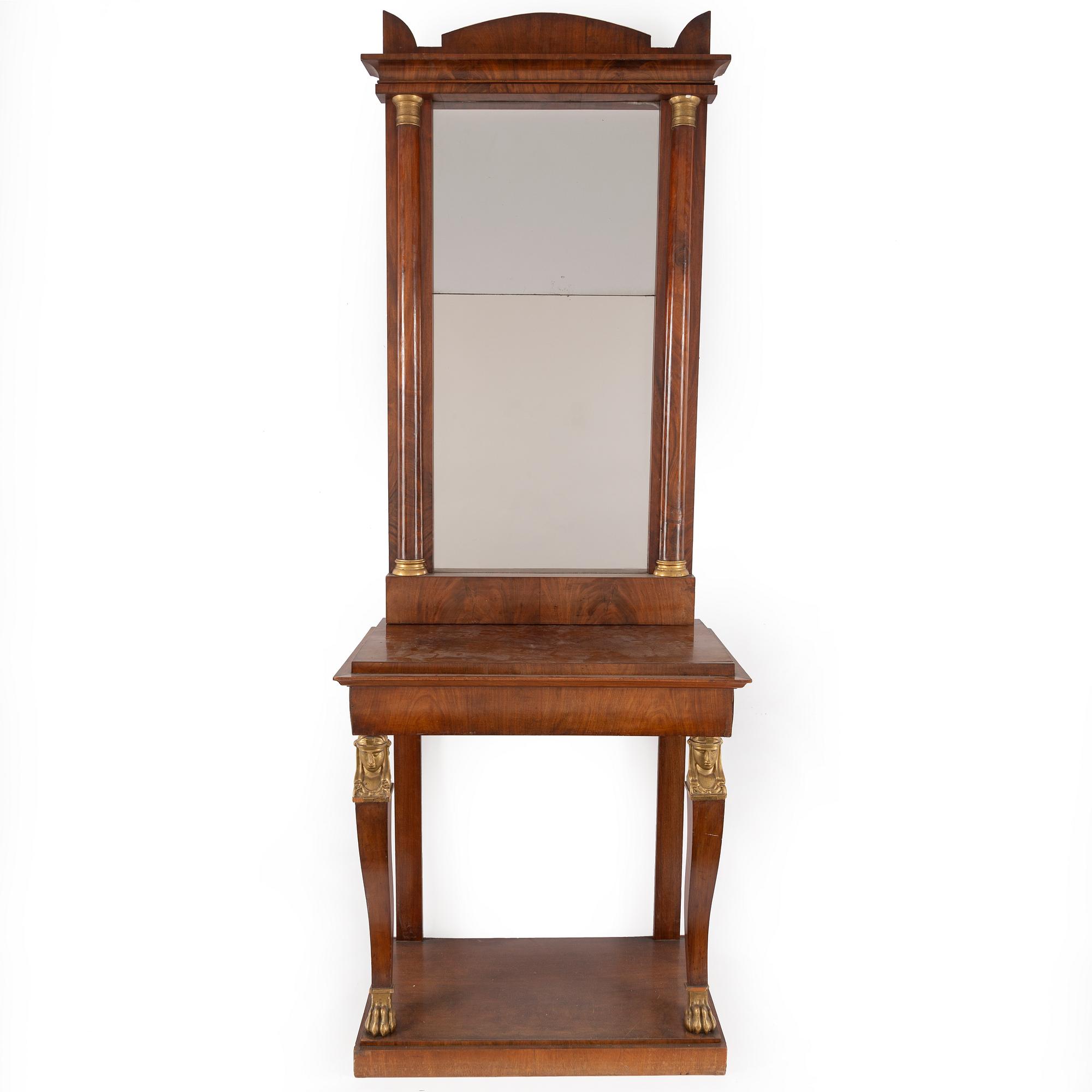 A Swedish Empire mirror and console table, first half of the 19th century.