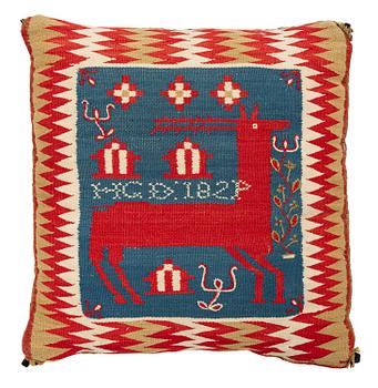 332. A double-interlocked tapestry cushion, c. 46 x 44 cm, probably Skytts district, signed and dated HGD 1824.