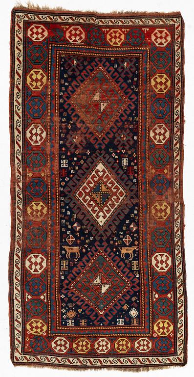 A antique Kazak gallery vcarpet, ca 240 x 120 cm.