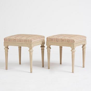 A pair of Gustavian stools by E Öhrmark.
