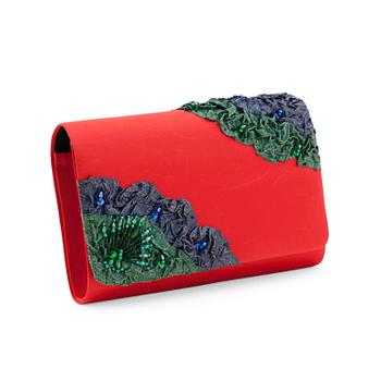 864. CORA JACOBS, a red silk and embossed leather clutch / evening bag.