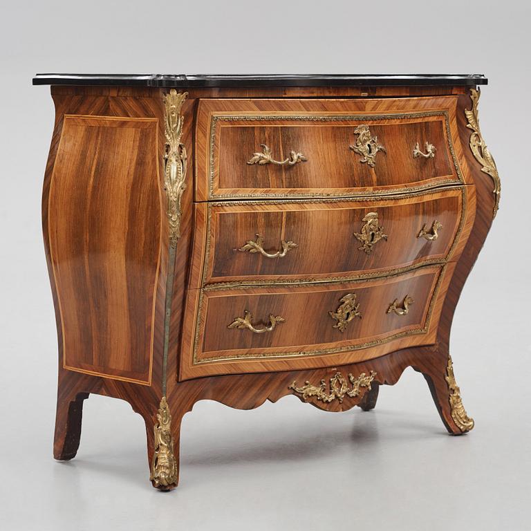 A rococo parquetry and gilt brass-mounted commode possibly by C. Åhman (master in Stockholm 1748-1783).