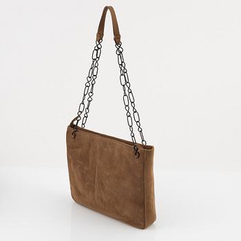 Prada, a tan suede bag.