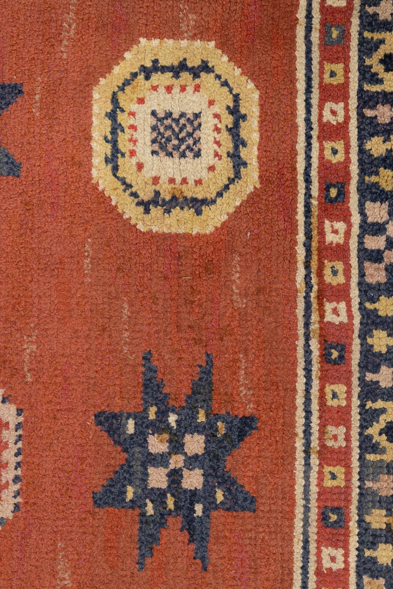 Märta Måås-Fjetterström, a carpet, "Röd Flossa", knotted pile, ca 300 x 272 cm, signed AB MMF.