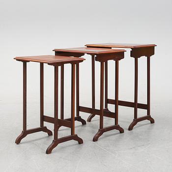 A three piece nesting table with inlay, first half of the 20th Century.