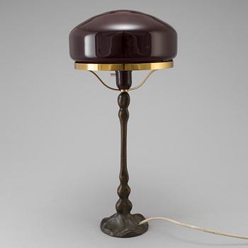 An art noveau table lamp.