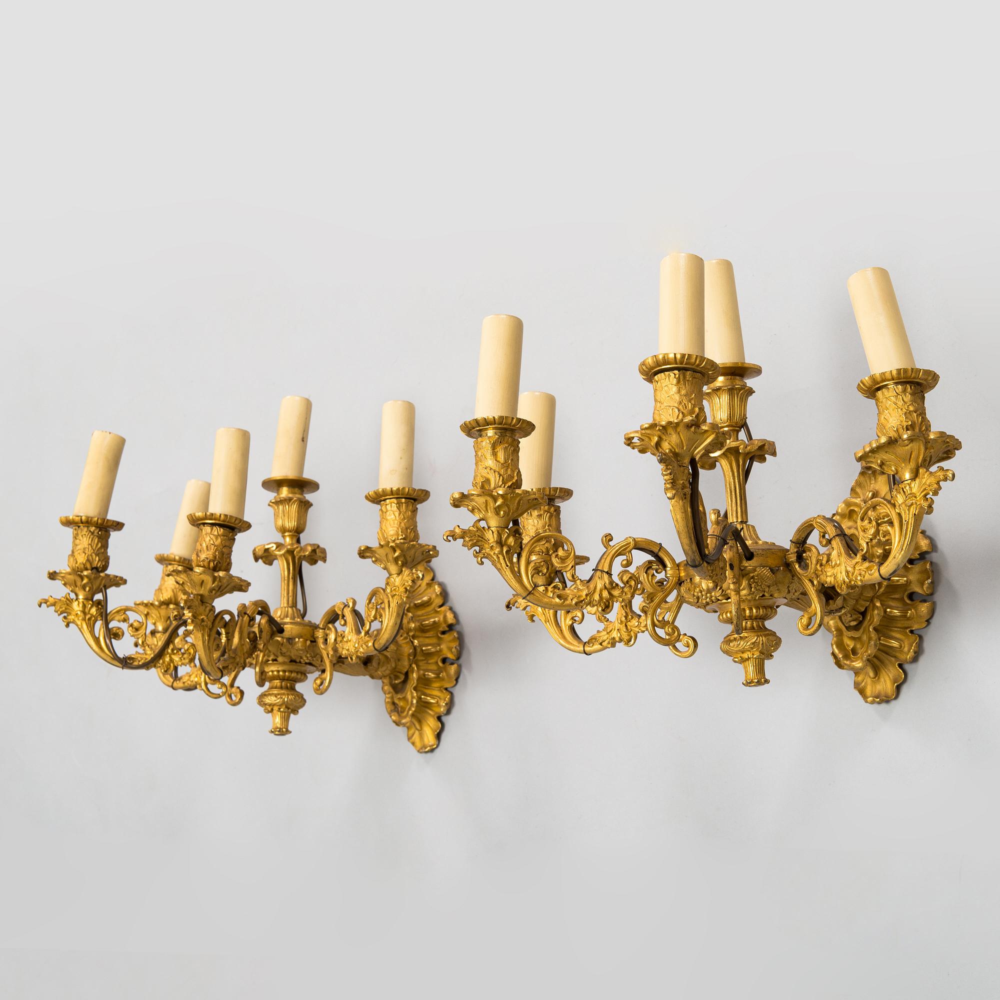 A pair of Empire wall candelabras in gilt bronze from first half of the 19th century.