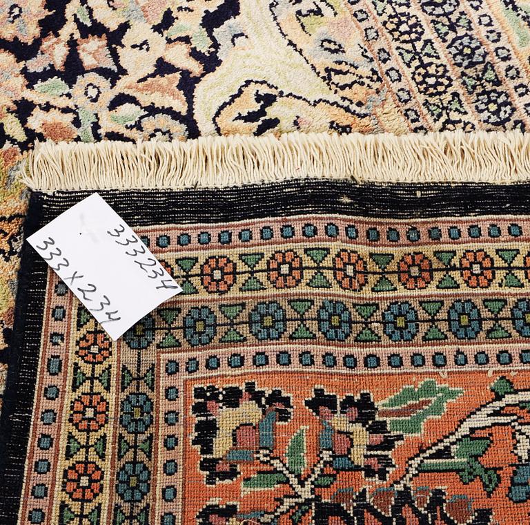 A Kashmir carpet, silk, c. 333 x 234 cm.