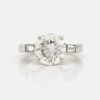851. A brilliant- and baguette cut diamond ring, Bentley & Skinner, London.