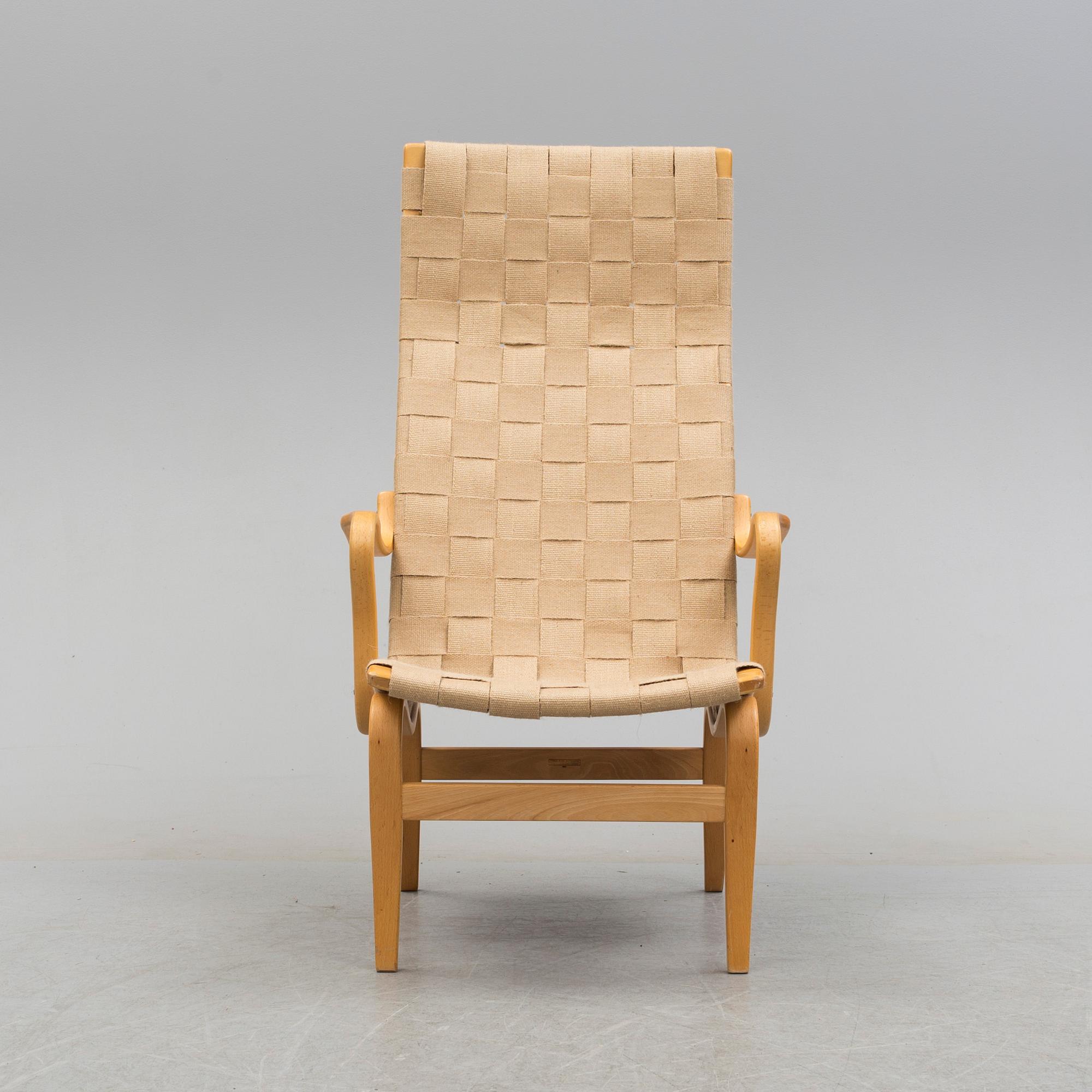 BRUNO MATHSSON, an 'Eva Hög' beech easy chair from Firma Karl Mathsson, Värnamo, 1971.