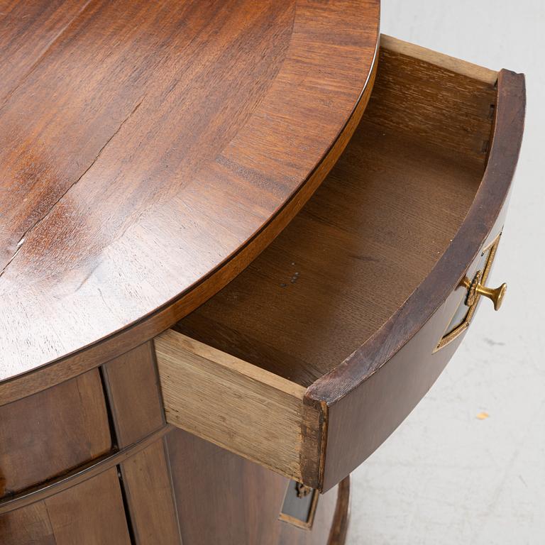 A pair of mahogany veneered empire style cabinets.