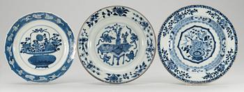 59. A set of three odd blue and white dishes, Qing dynasty, Kangxi (1662-1722).