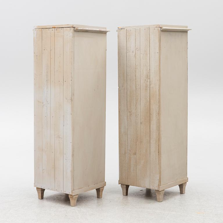 A pair of column cabinets, circa 1900.