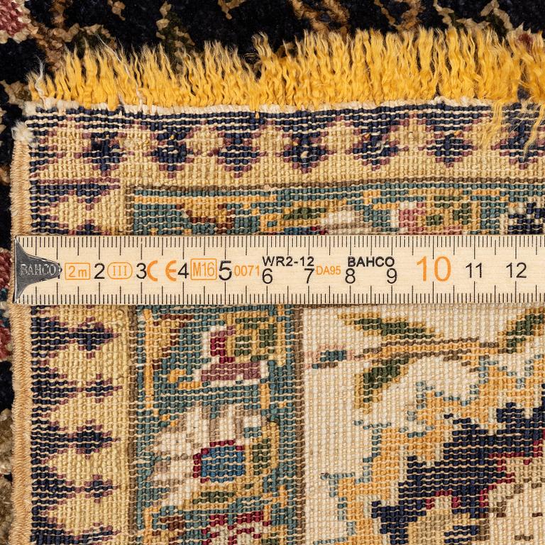 An antique silk Paderma/Kayseri rug, c. 217 x 153 cm.