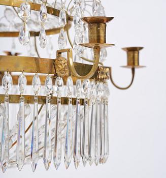 A late Gustavian gilt brass and cut glass seven-light chandelier, Stockholm, late 18th century.
