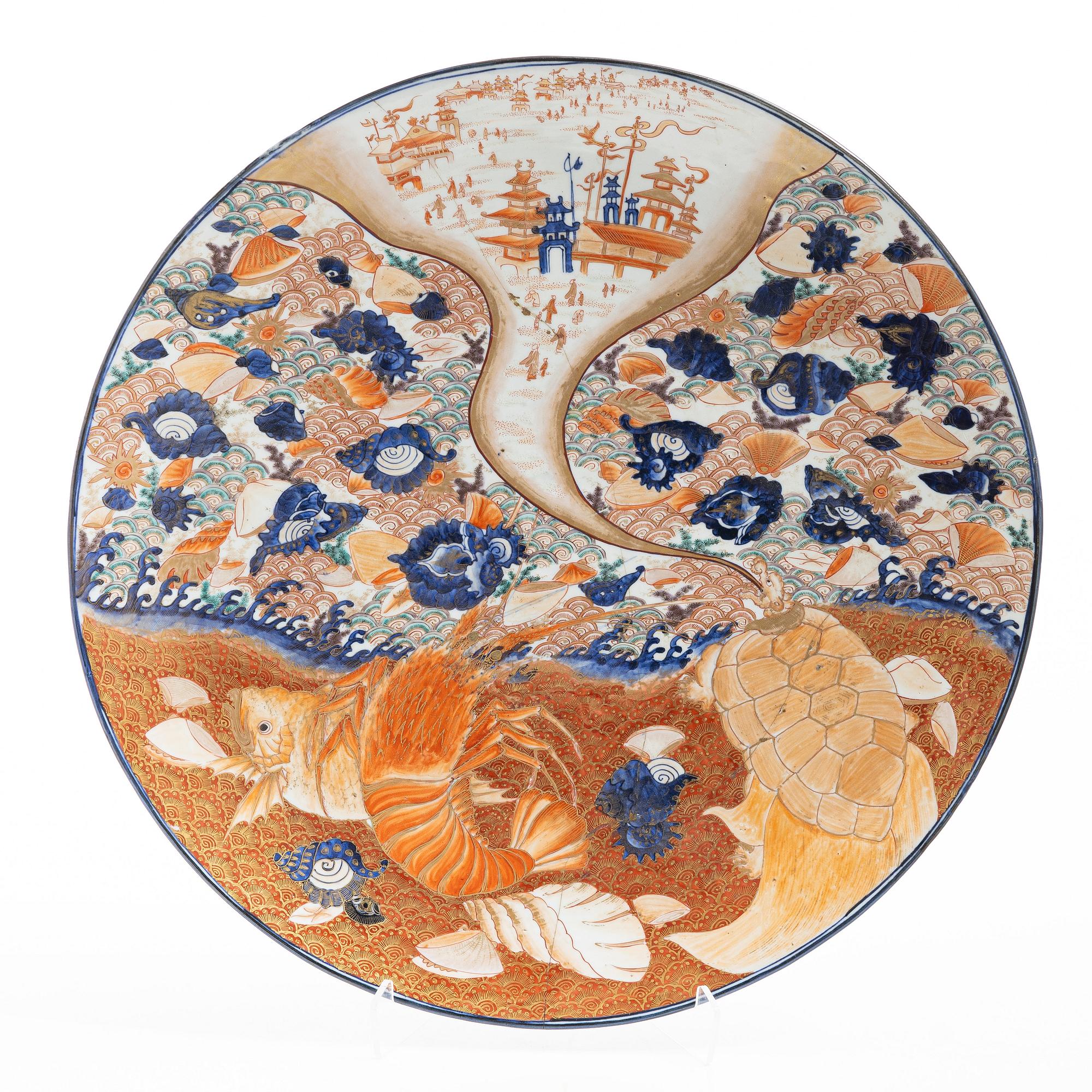 A massive Japanese imari charger, Meiji period (1868-1912). Signed.