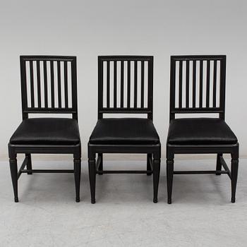 a set of three gustavian chairs.