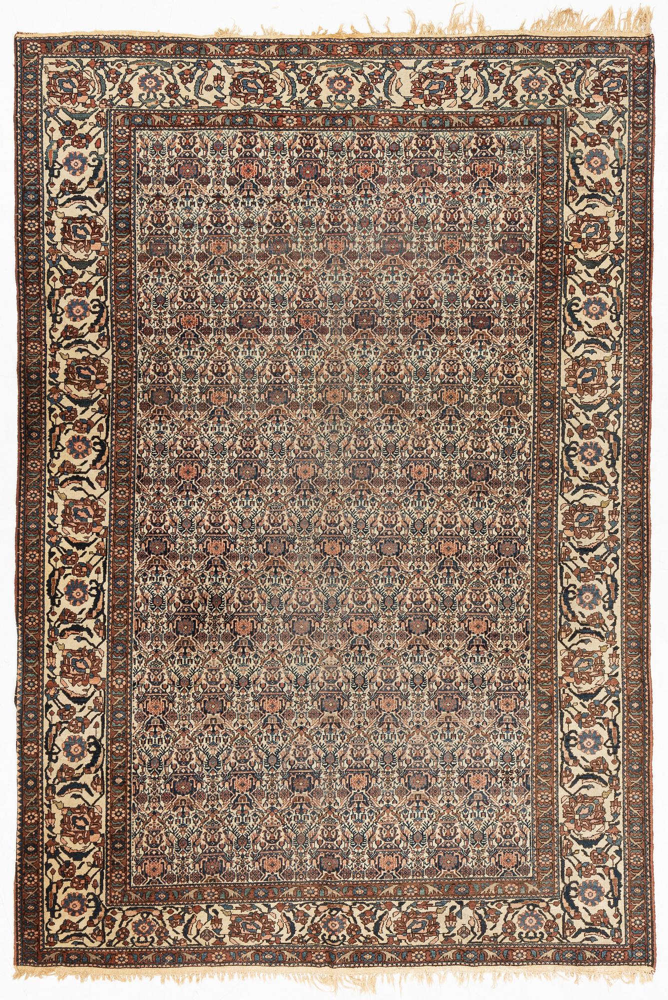A Heris carpet, 305 x 205 cm.