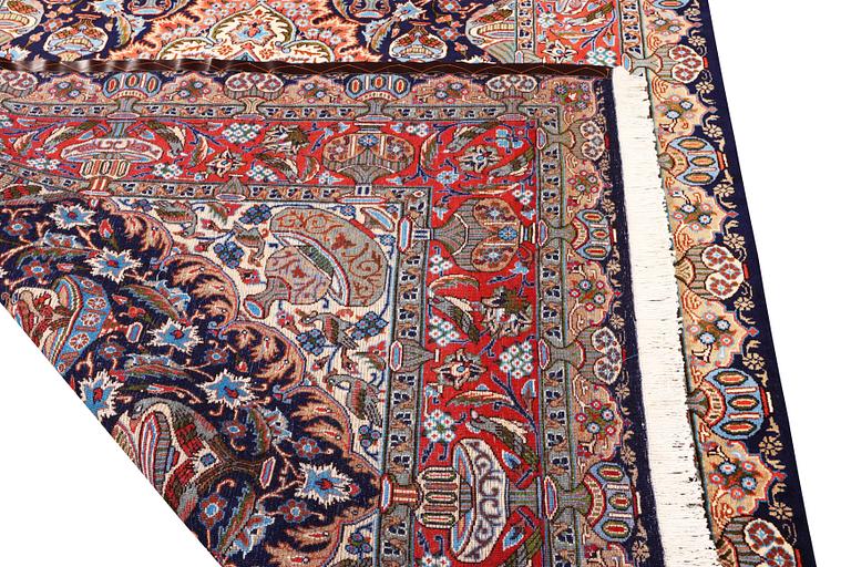 A Kashmar carpet, c. 310 x 203 cm.